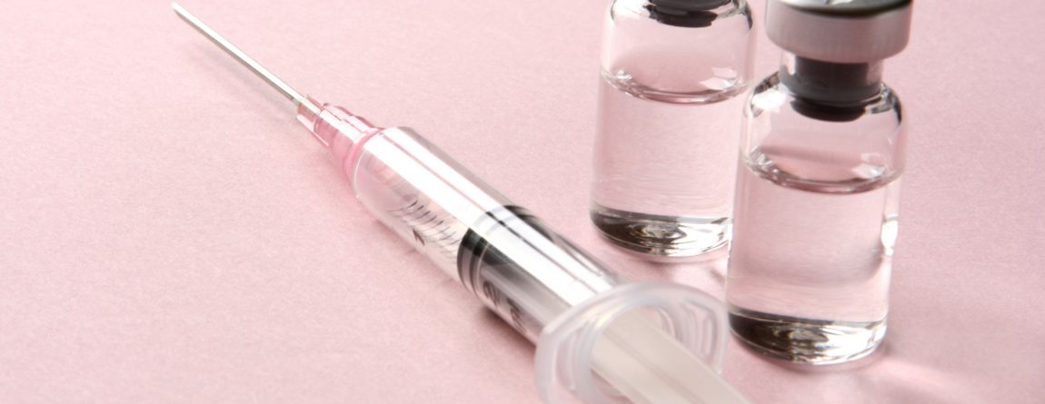 Vaccination: Syringe and Vials with Medicine