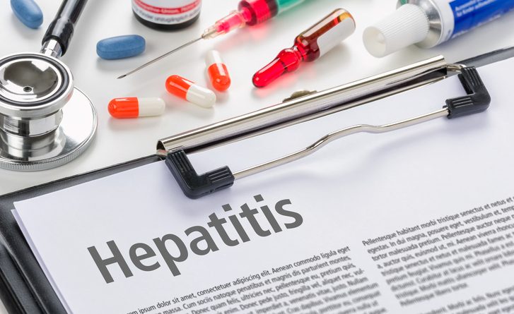The diagnosis Hepatitis written on a clipboard